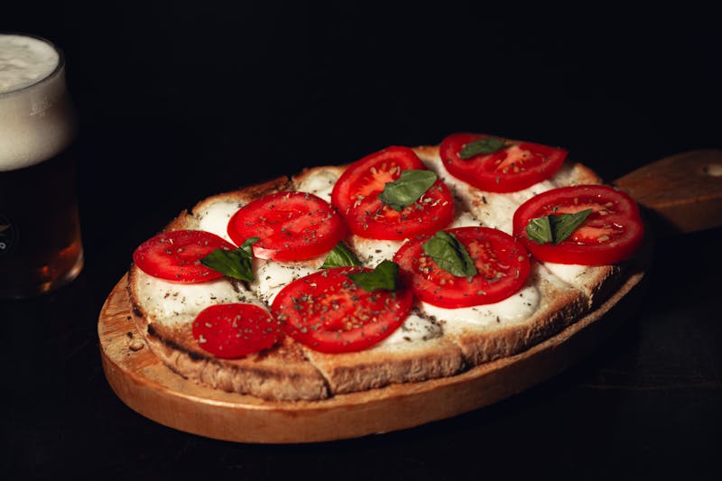 Bruschetta topped with diced tomatoes and basil